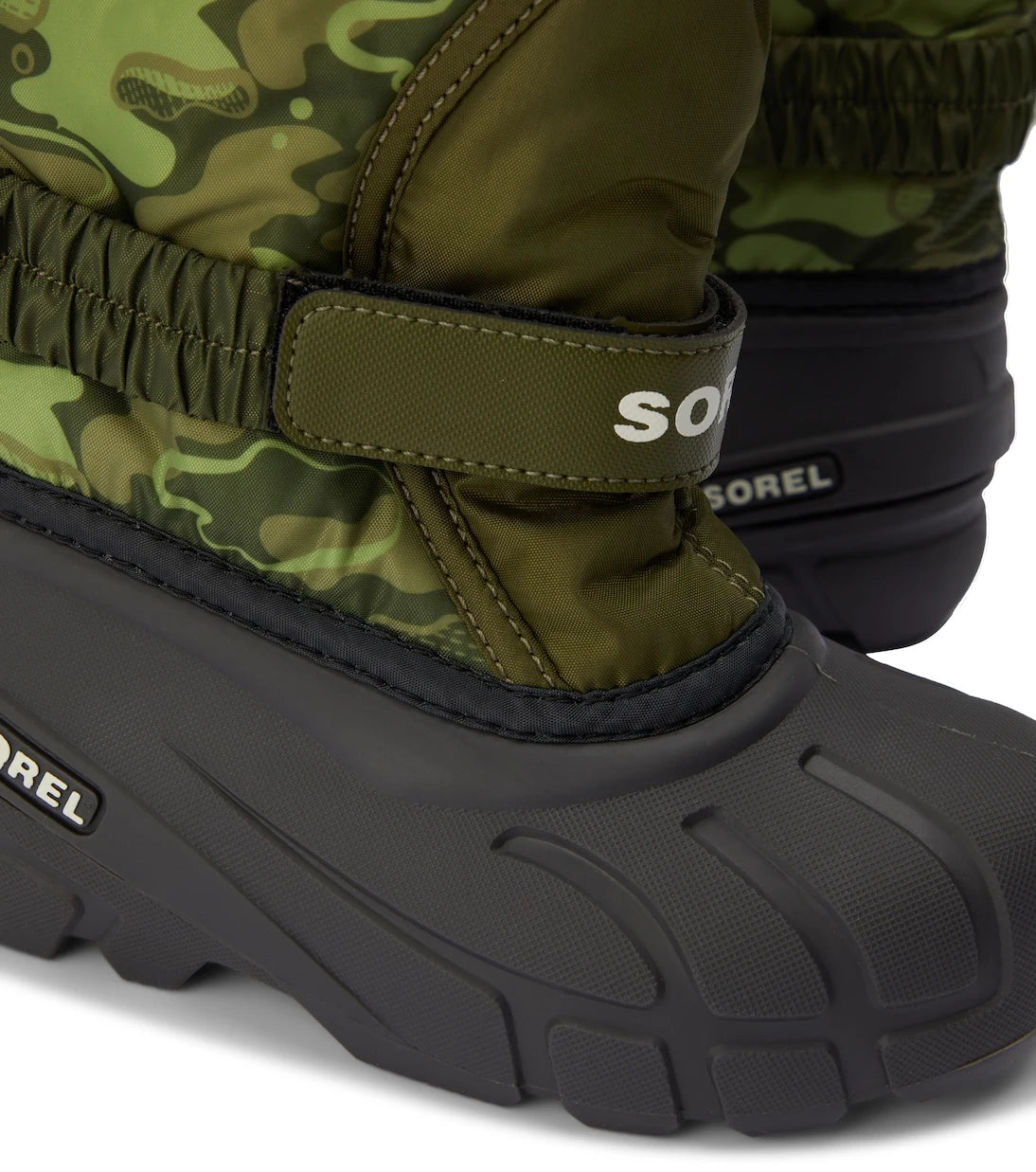 Sorel Kids - أحذية فلوري الثلجية المطبوعة