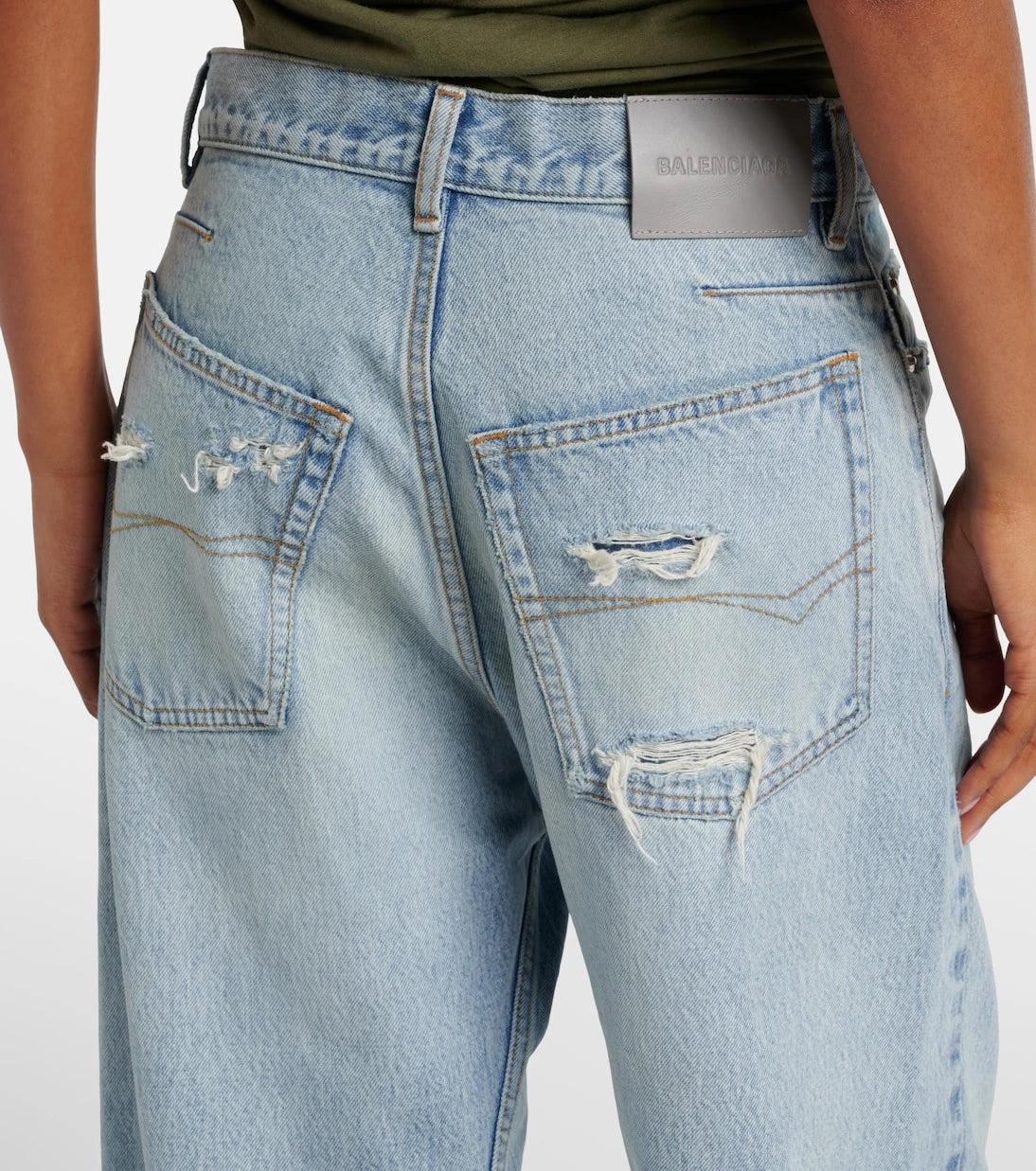 Balenciaga - Frayed tapered jeans