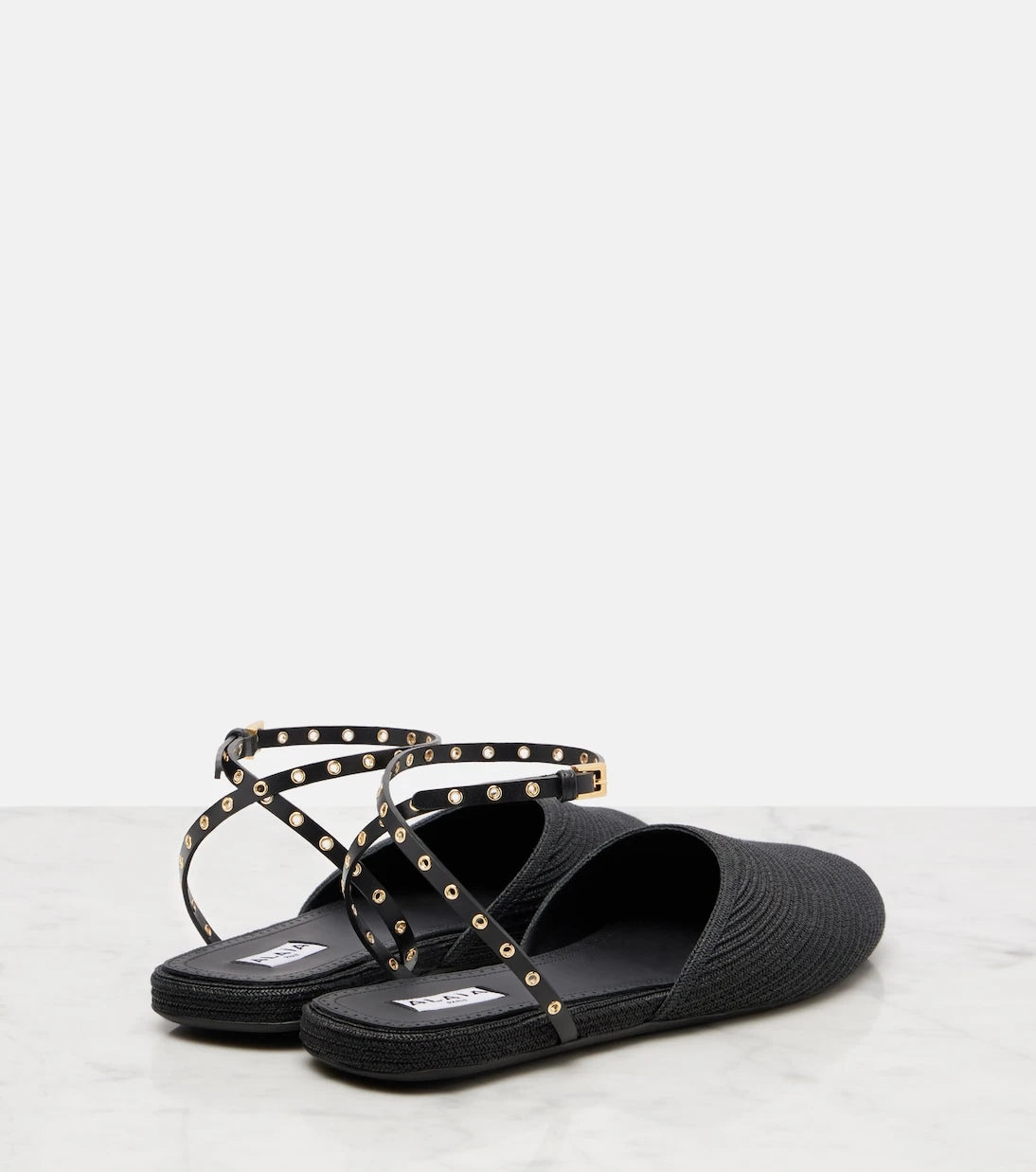 Alaïa - Leather-trimmed slingback flats