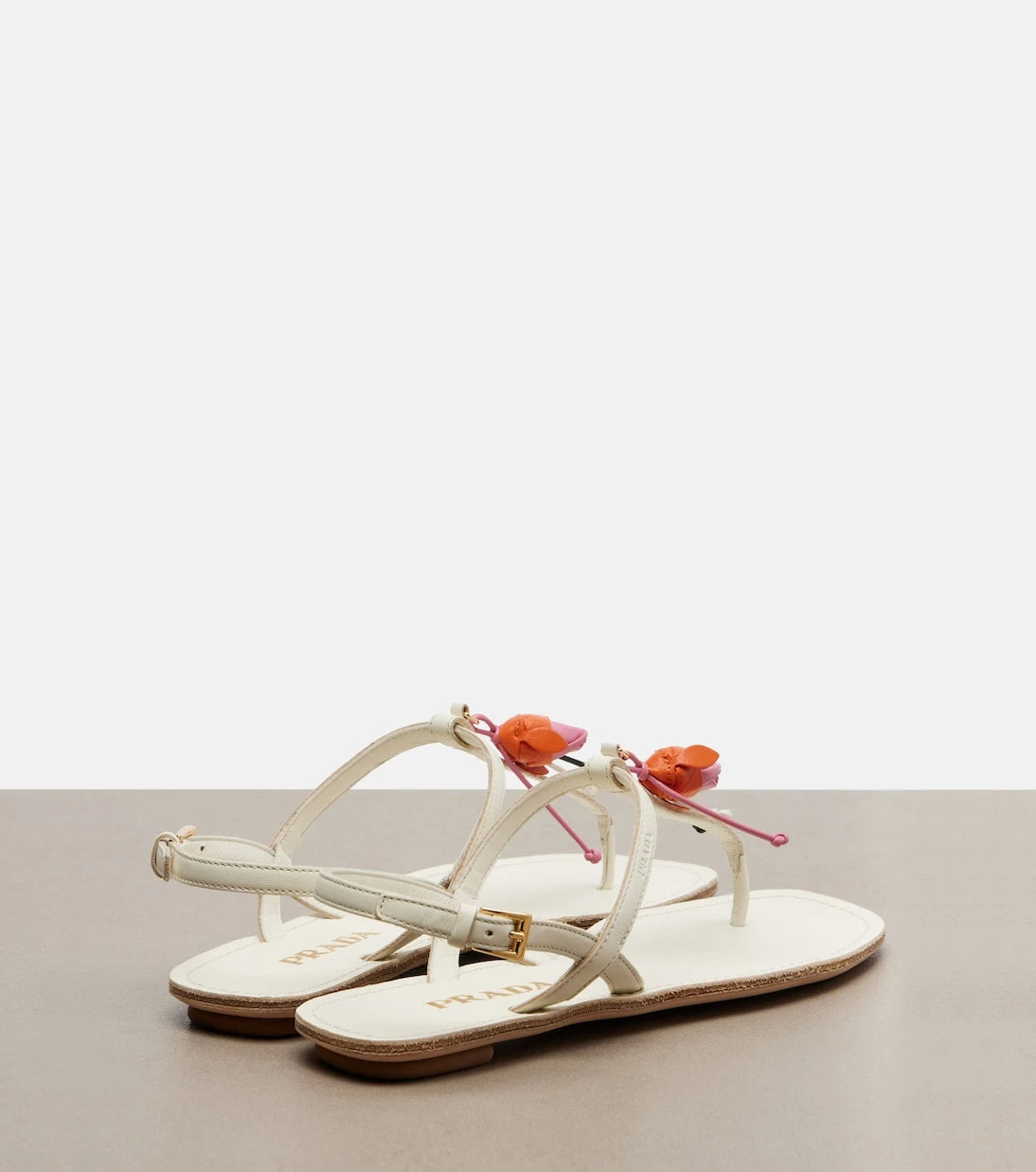 Prada - Floral-appliqué leather thong sandals