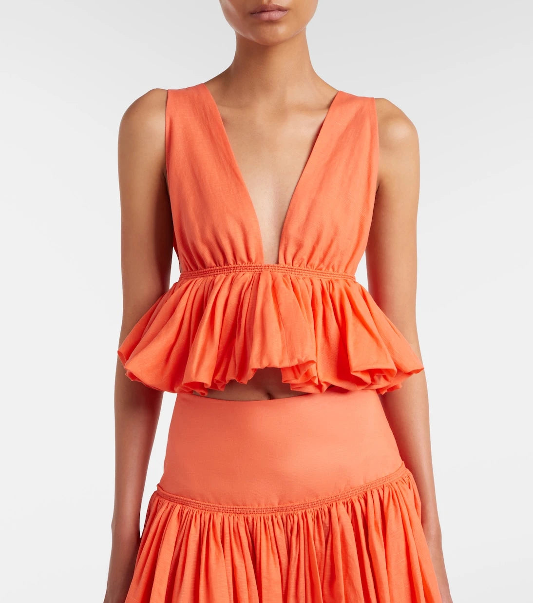 Alaïa - Peplum striped cotton and linen top