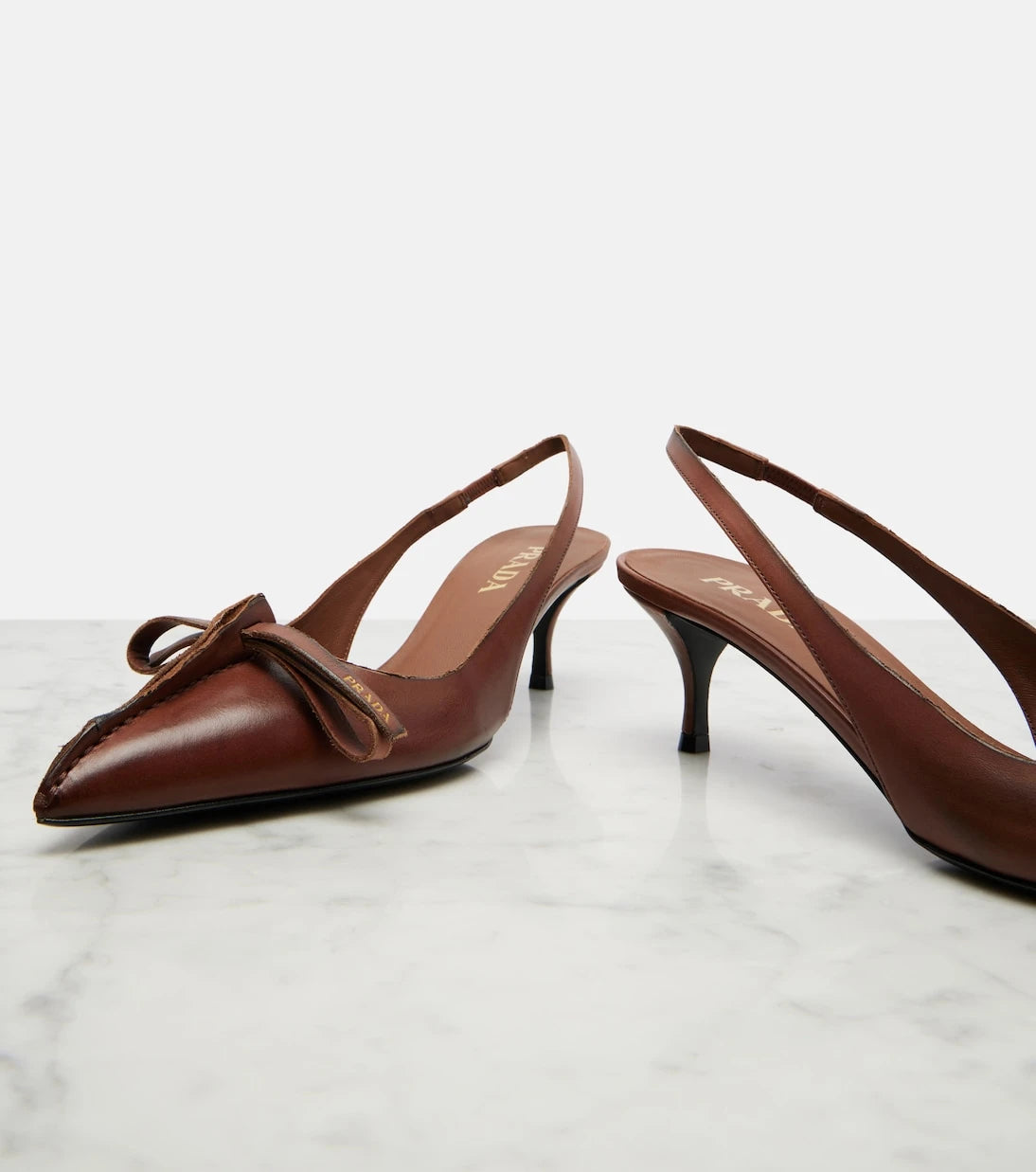 Prada - Leather slingback pumps