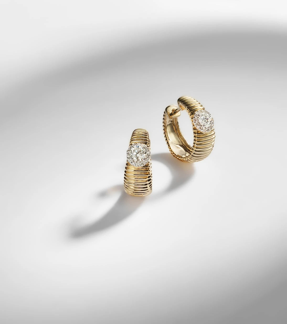 Stone and Strand - Disco 14kt gold huggies with diamonds