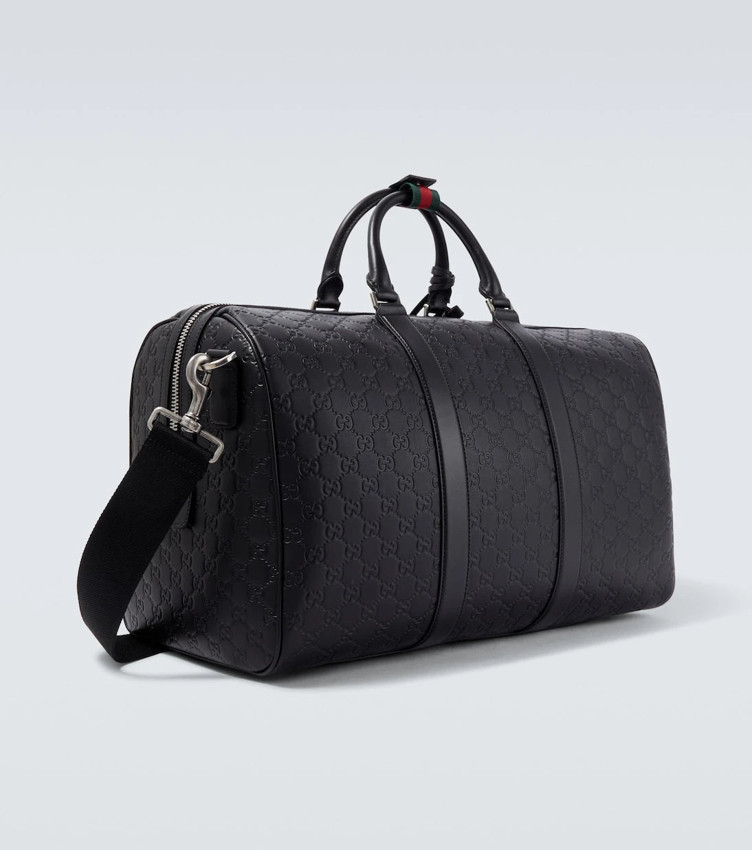 Gucci - حقيبة دافل متوسطة من الجلد بشعار GG