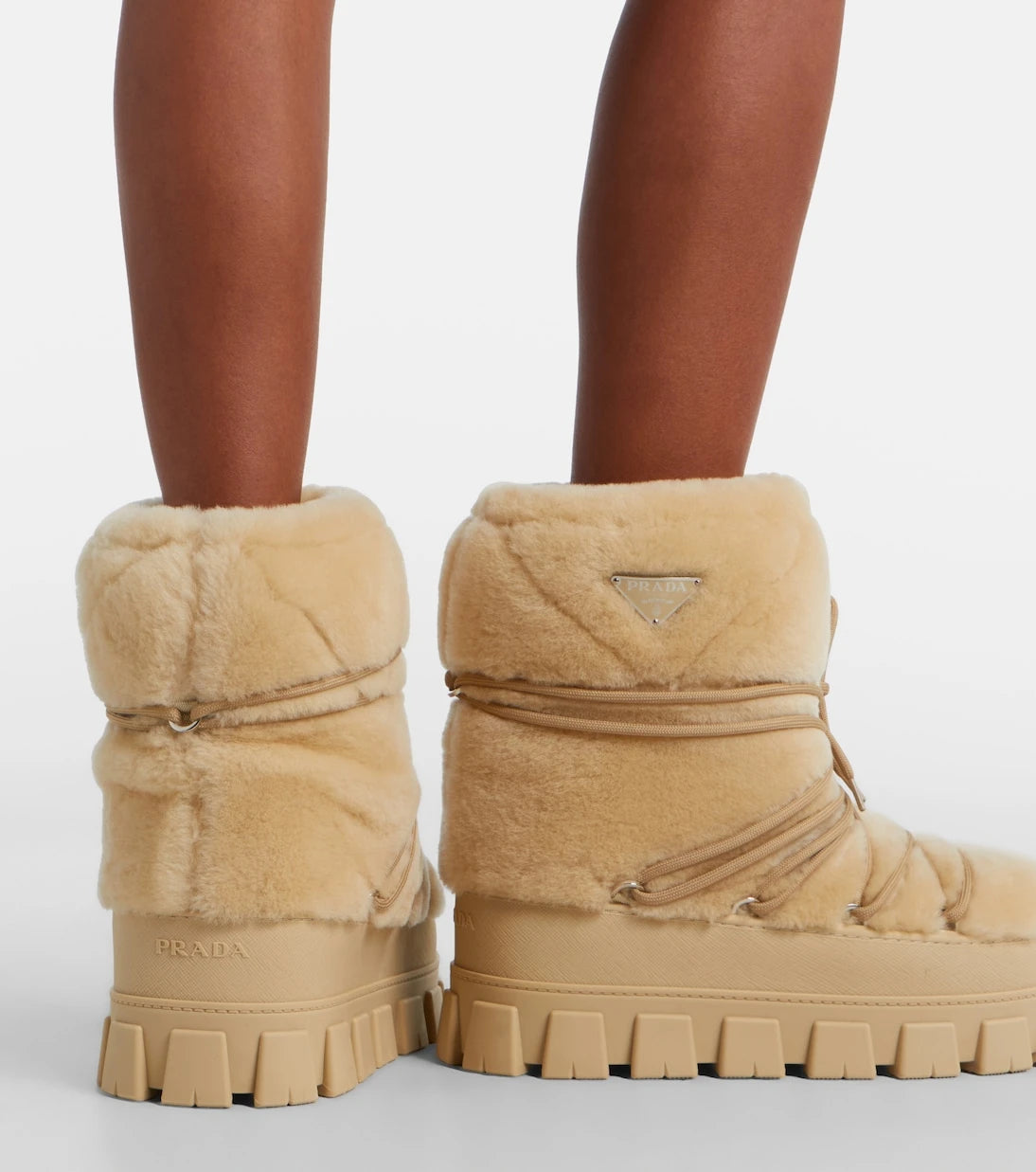 Prada - Shearling and leather snow boots