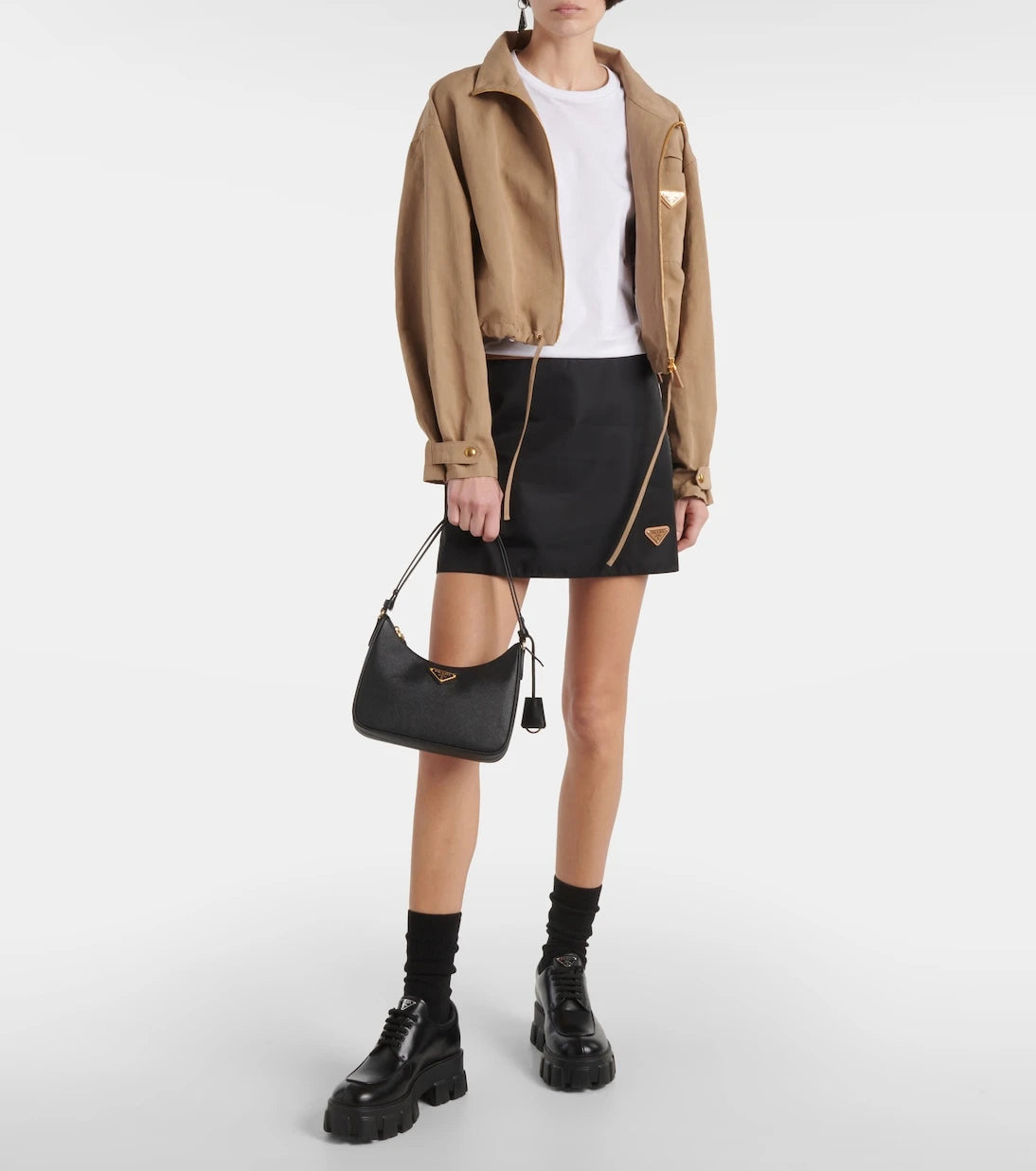 Prada - حقيبة كتف Re-Edition Mini من الجلد