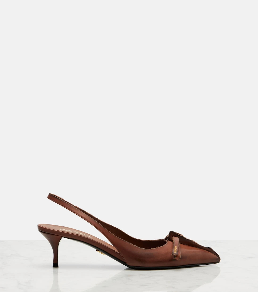 Prada - Leather slingback pumps