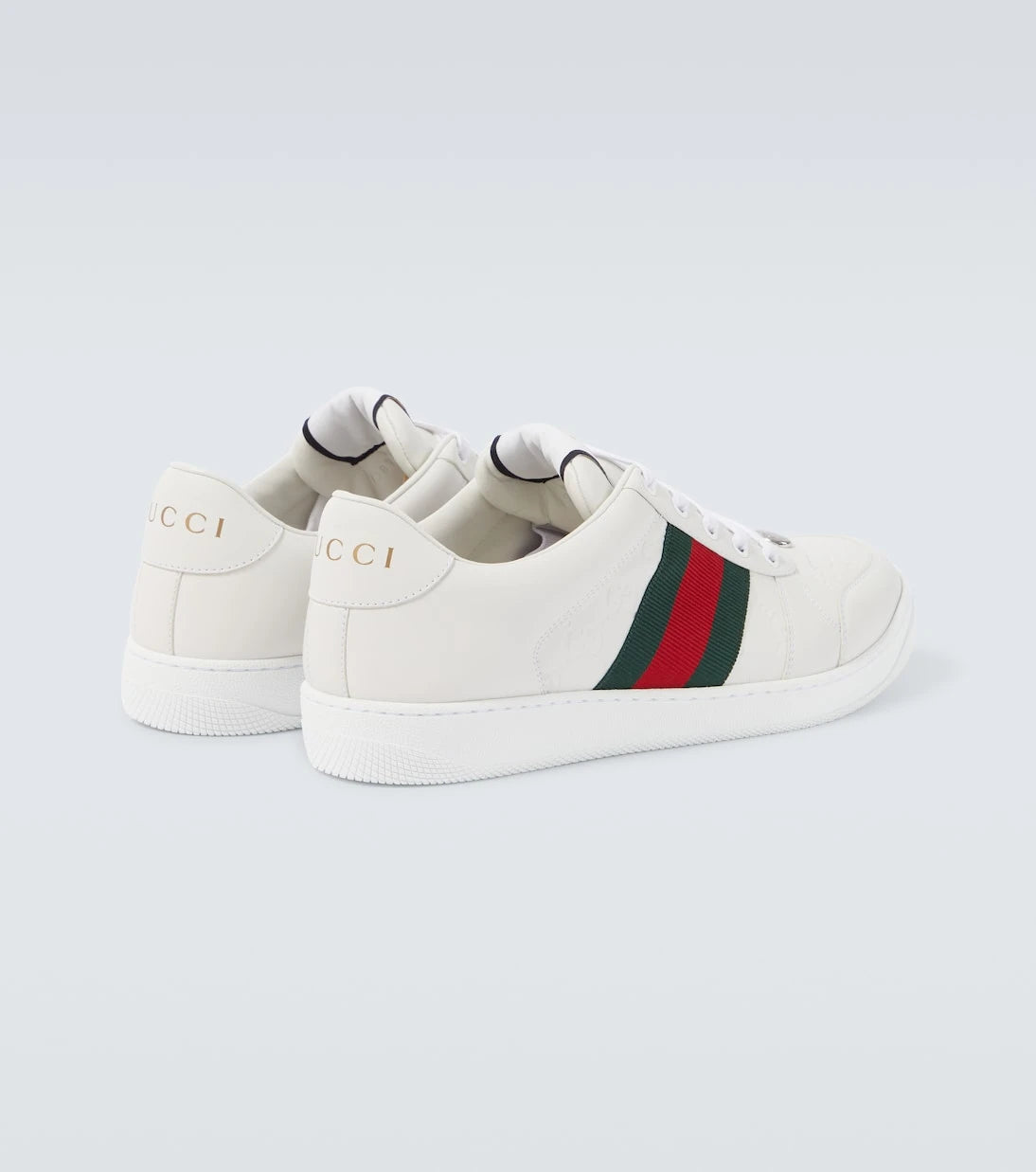 Gucci - حذاء سكرينر الرياضي من الجلد المنقوش