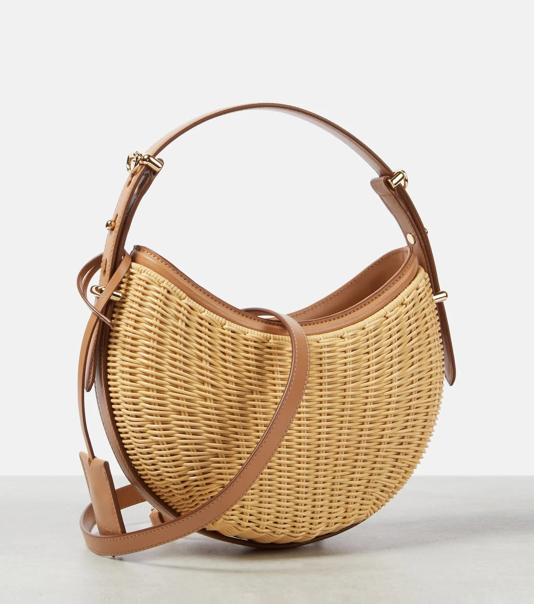 Prada - Arqué woven leather-trimmed shoulder bag