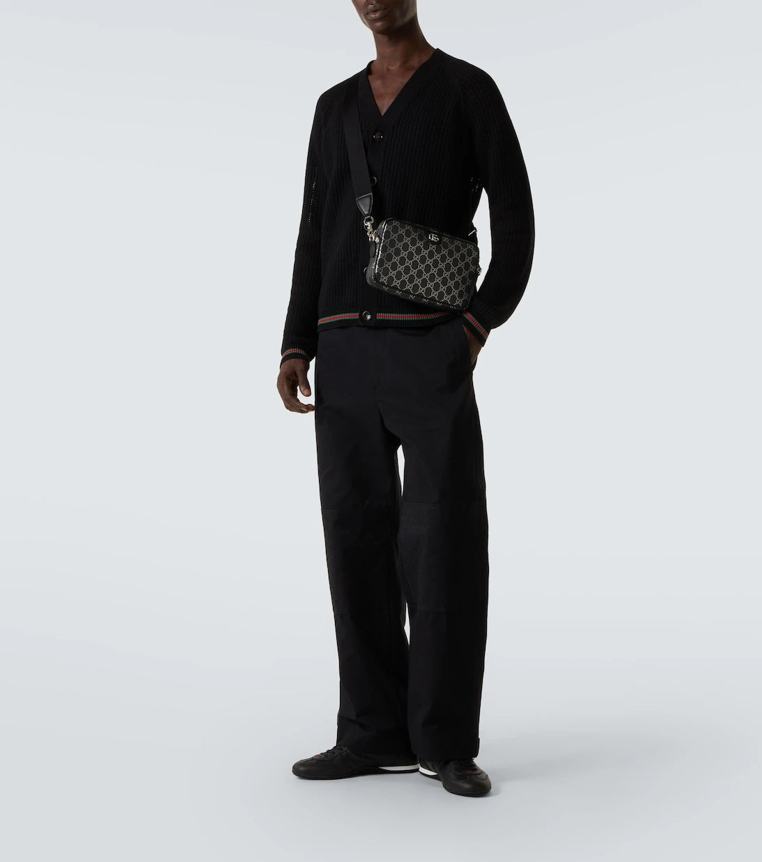 Gucci - حقيبة كتف GG مزينة بالجلد