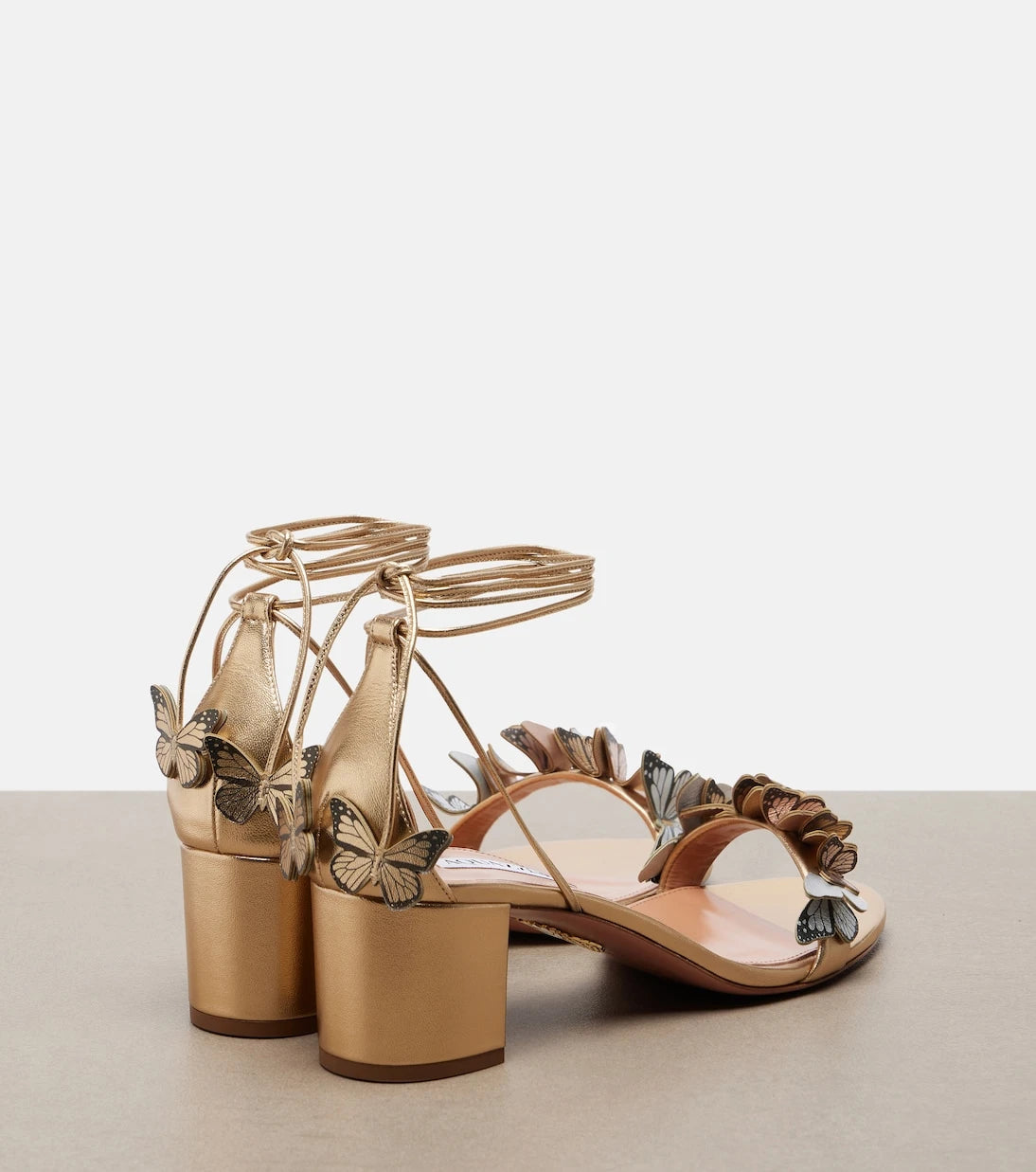 Aquazzura - Papillon appliqué metallic leather sandals