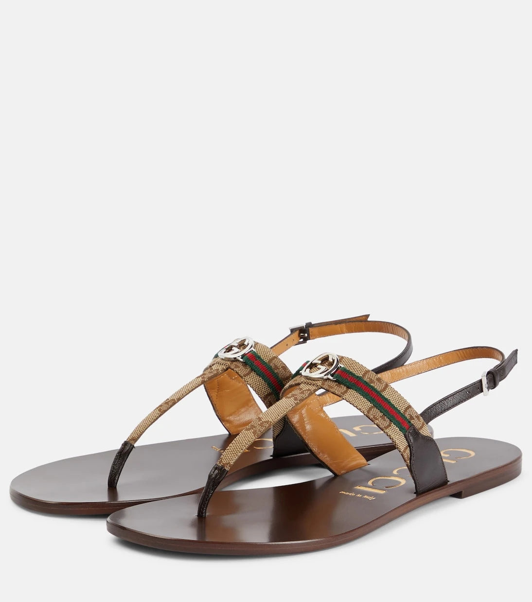 Gucci - صنادل ثونغ مزينة بالجلد