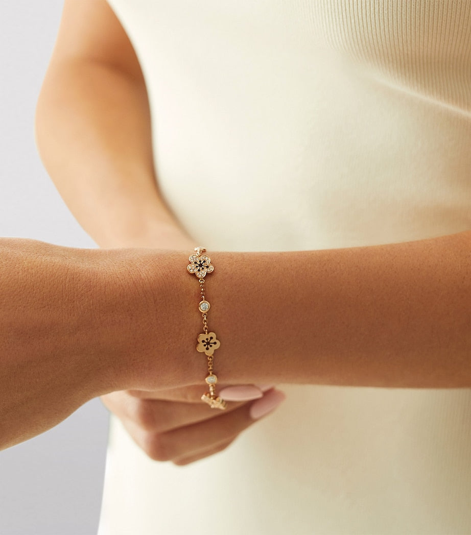 Rose Gold and Diamond Blossom Charm Bracelet