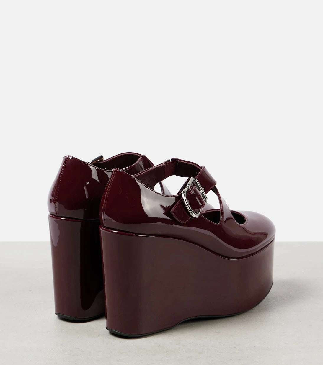 Alaïa - Criss Cross patent leather wedges