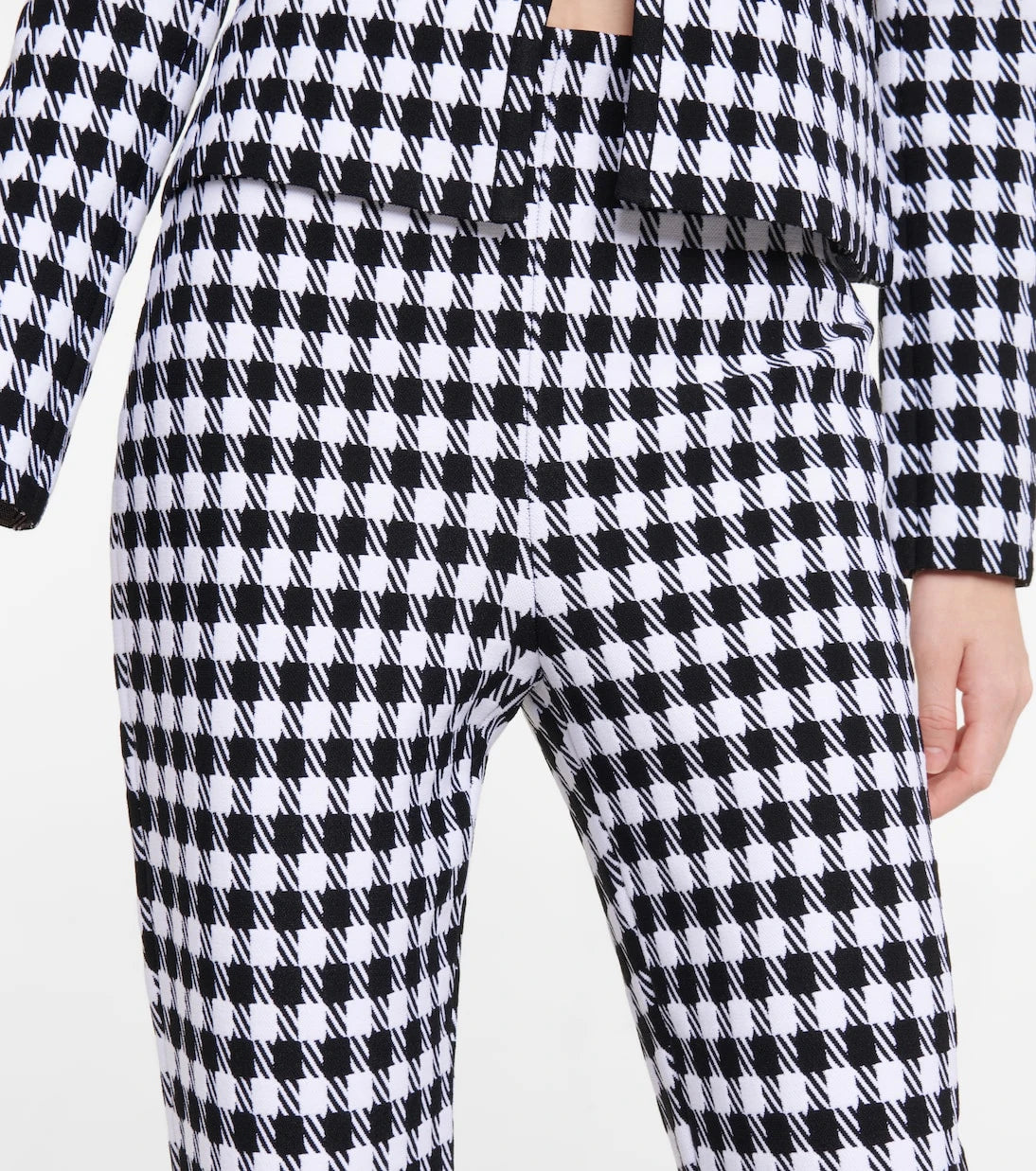 Alaïa - High-rise checked stirrup pants