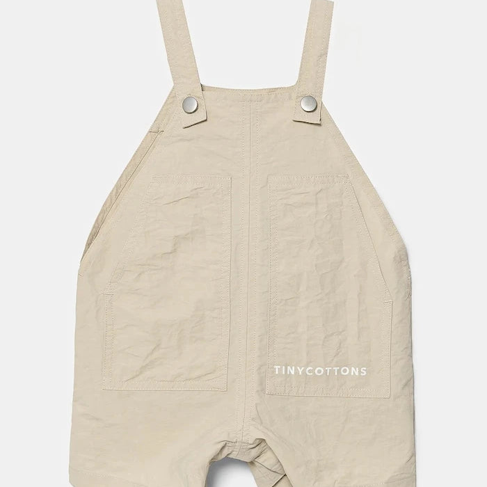 Бебешки къс гащеризон Tinycottons SOLID SHORT DUNGAREE