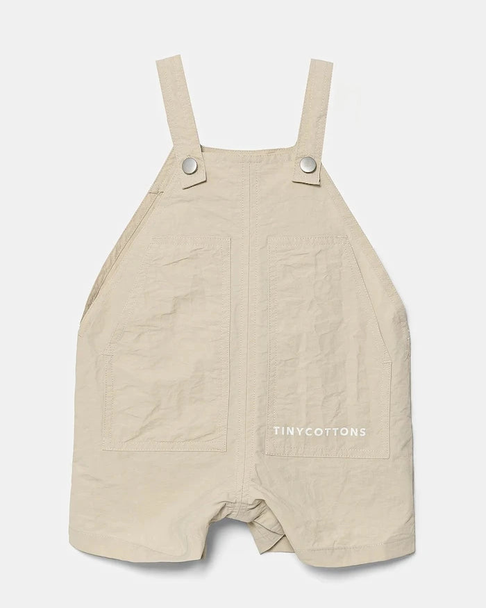 Бебешки къс гащеризон Tinycottons SOLID SHORT DUNGAREE