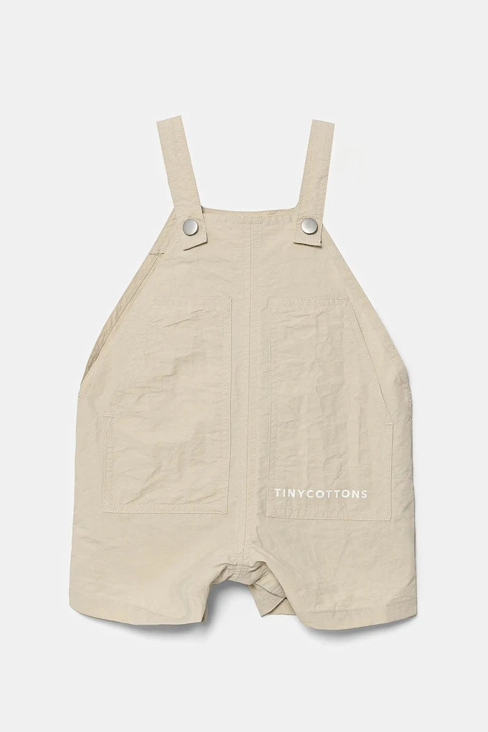 Бебешки къс гащеризон Tinycottons SOLID SHORT DUNGAREE