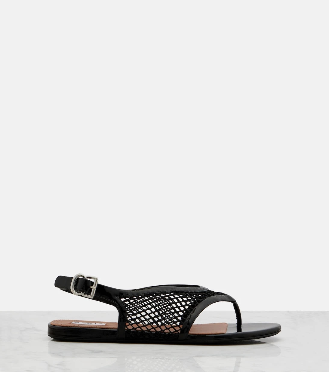 Alaïa - Fishnet leather-trimmed thong sandals