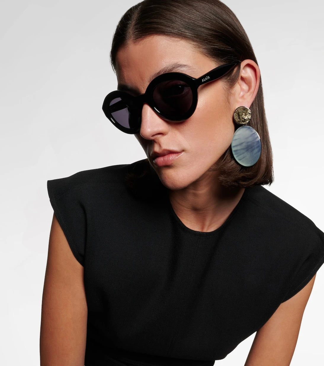 Alaïa - Lettering Logo round sunglasses