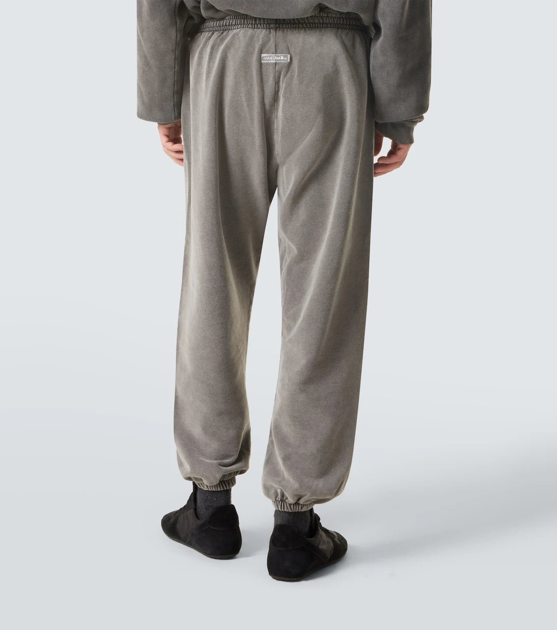 Acne Studios - سروال رياضي قطني باهت