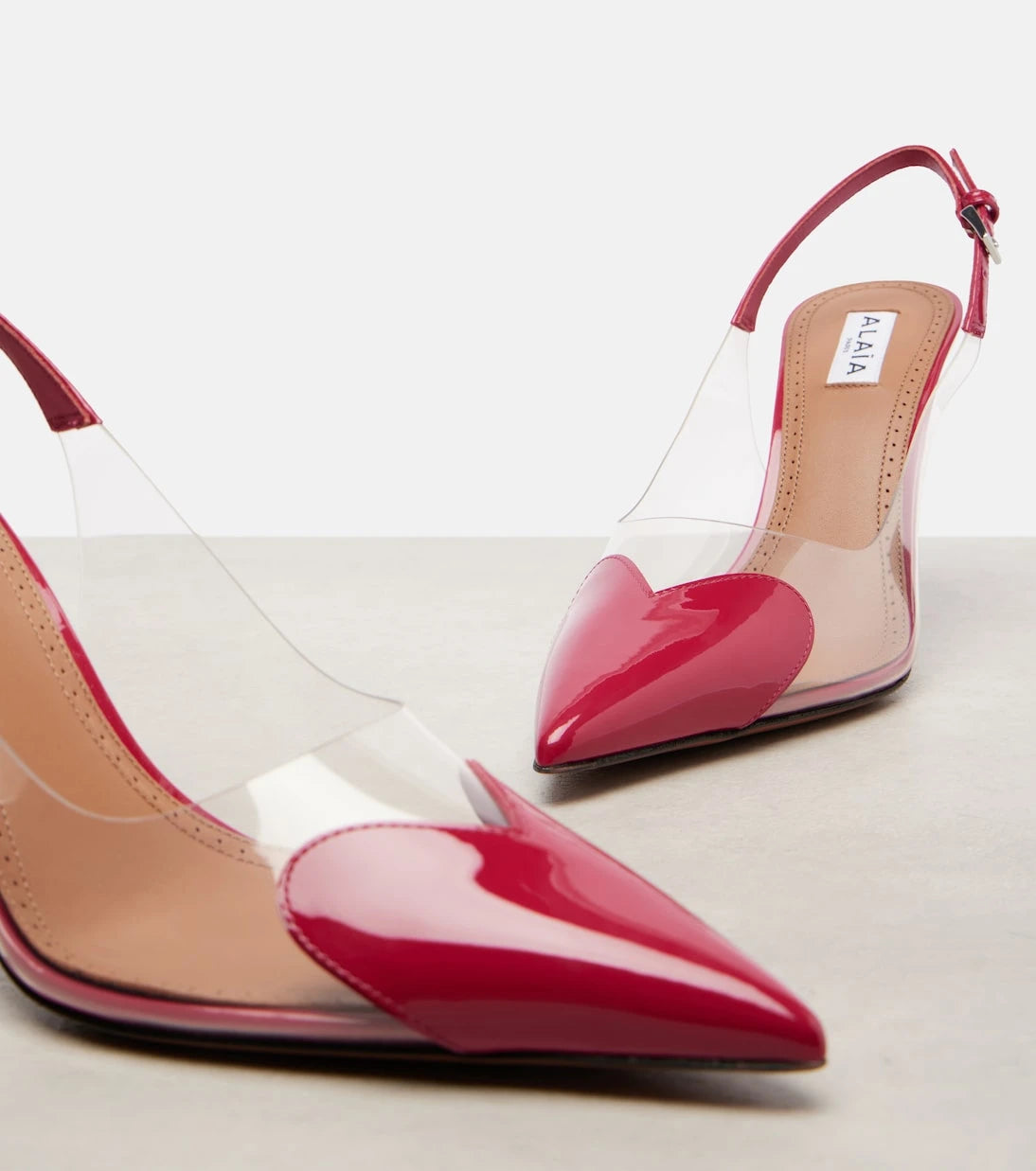 Alaïa - Le Cœur 90 patent leather slingback pumps