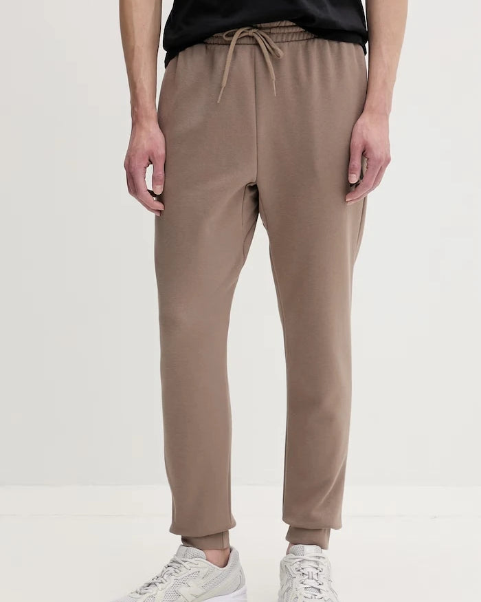 adidas pamuklu erkek eşofman altı Essentials Feelcozy