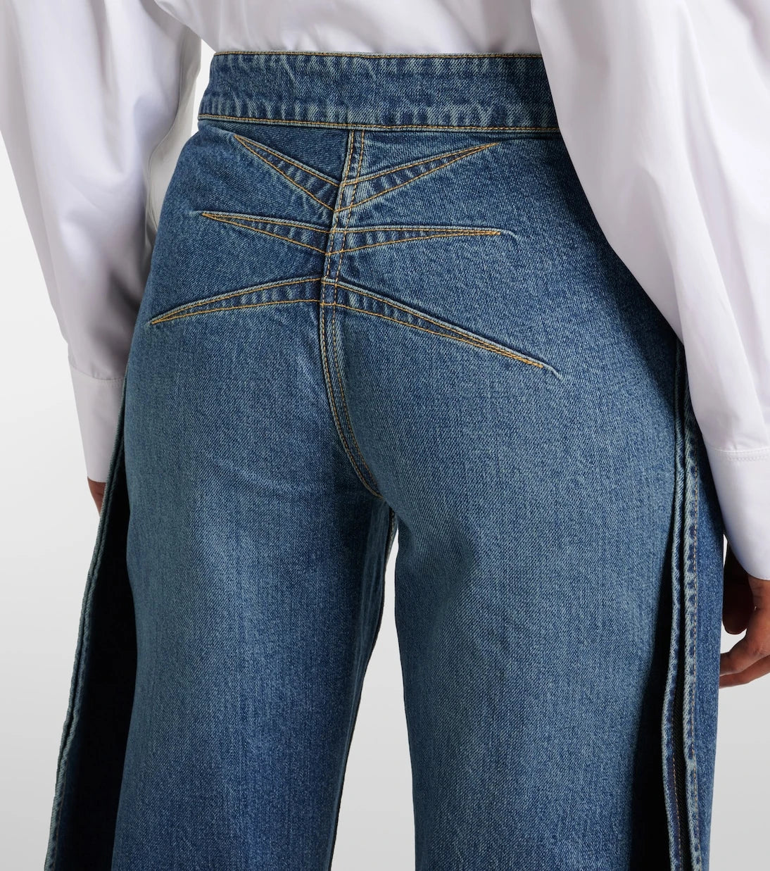 Alaïa - Petal high-rise barrel-leg jeans