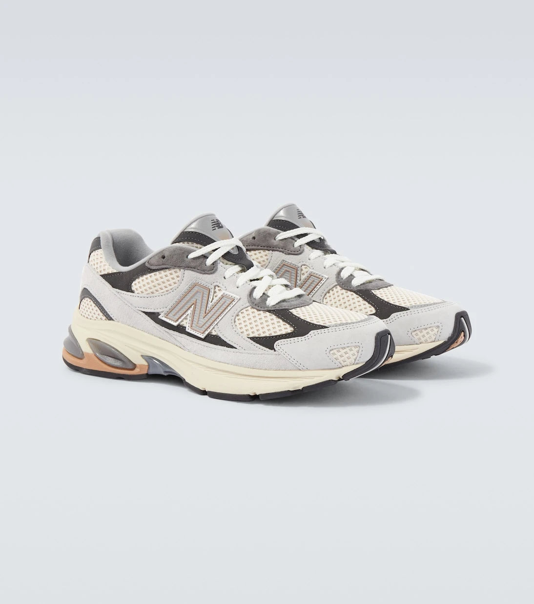 New Balance - حذاء رياضي شبكي وجلد سويدي 2010