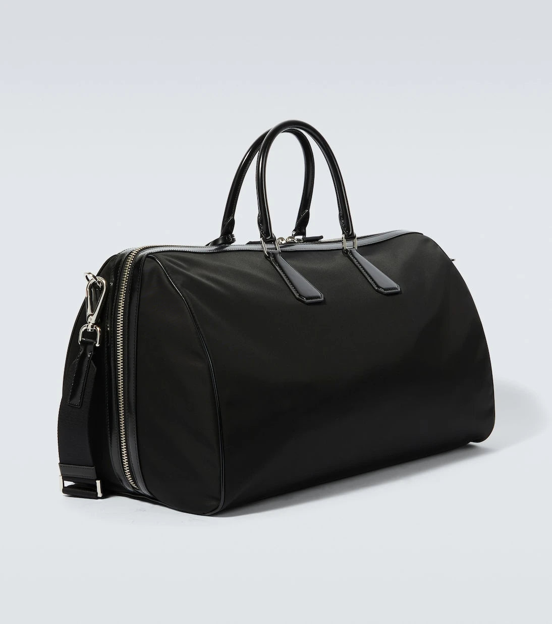 Prada - Leather-trimmed duffel bag