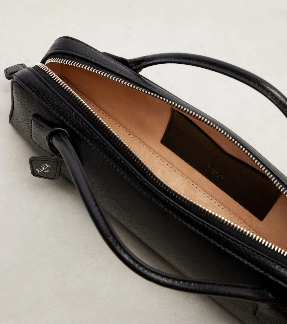 Alaïa - Le Teckel Small leather clutch