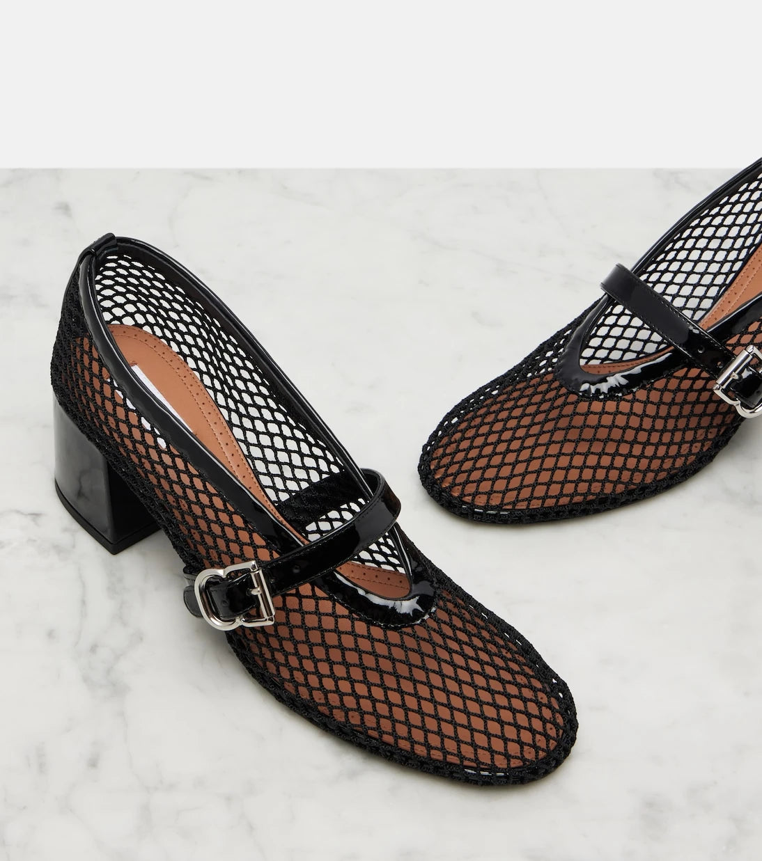 Alaïa - Fishnet leather-trimmed Mary Jane pumps