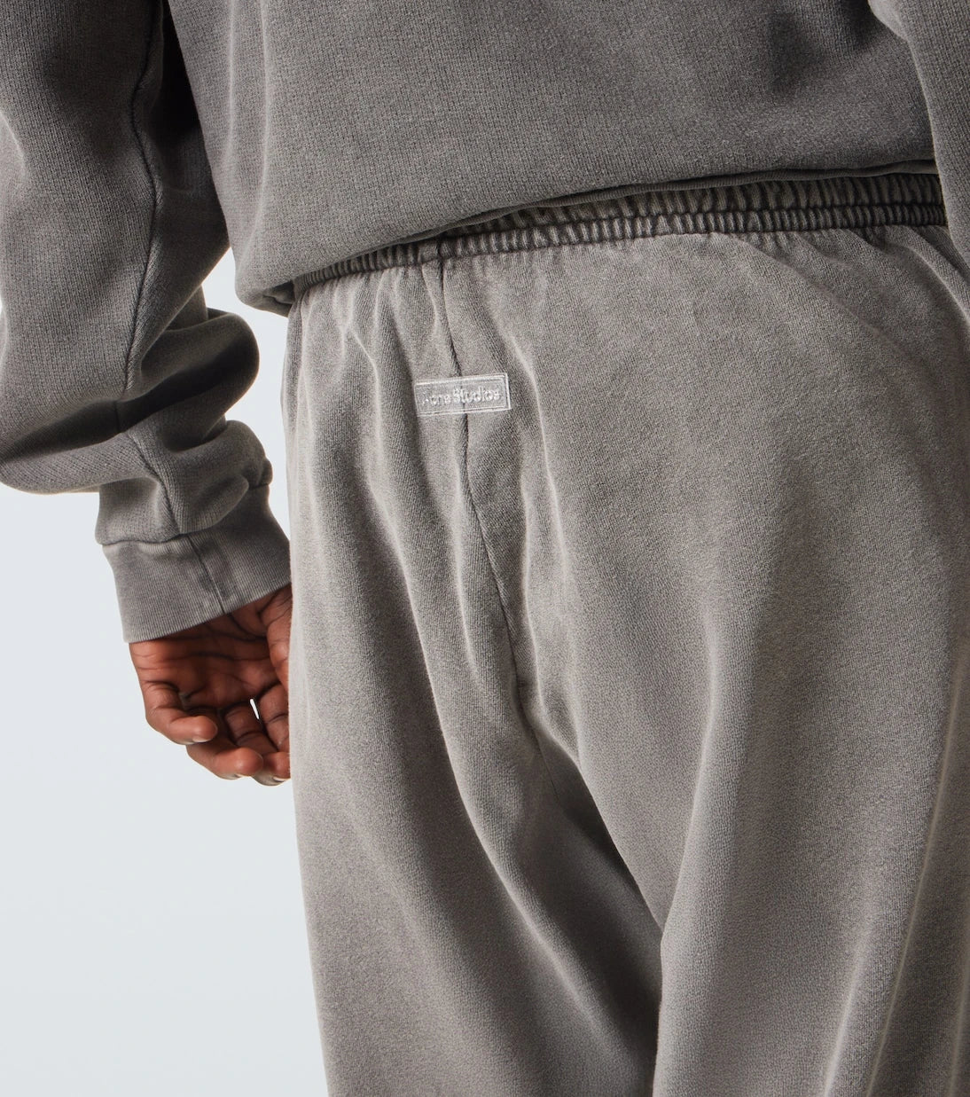 Acne Studios - سروال رياضي قطني باهت