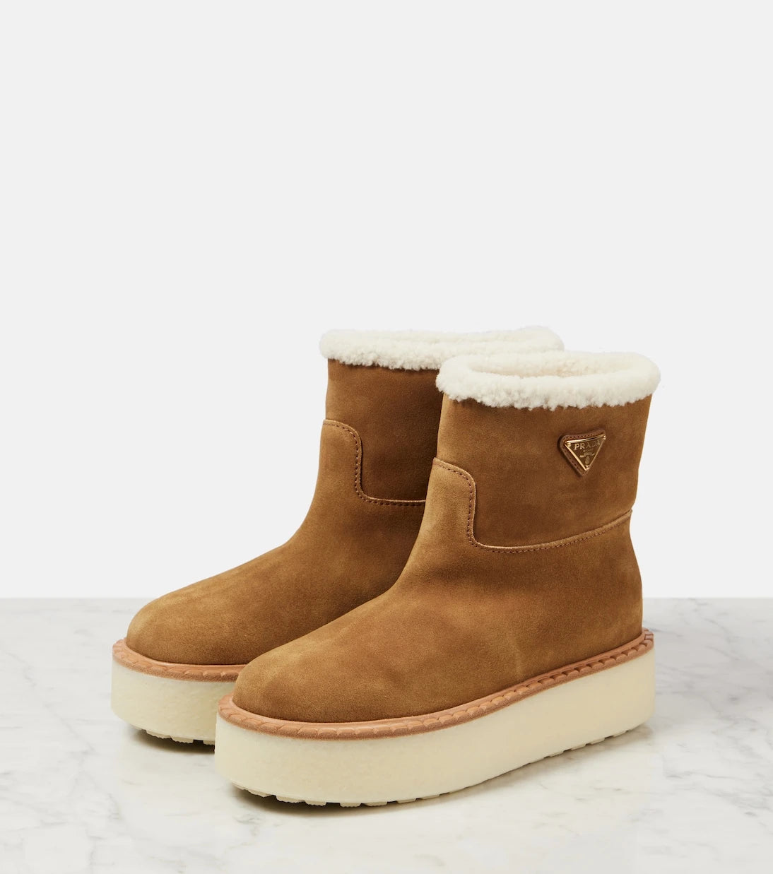 Prada - Shearling-lined suede ankle boots