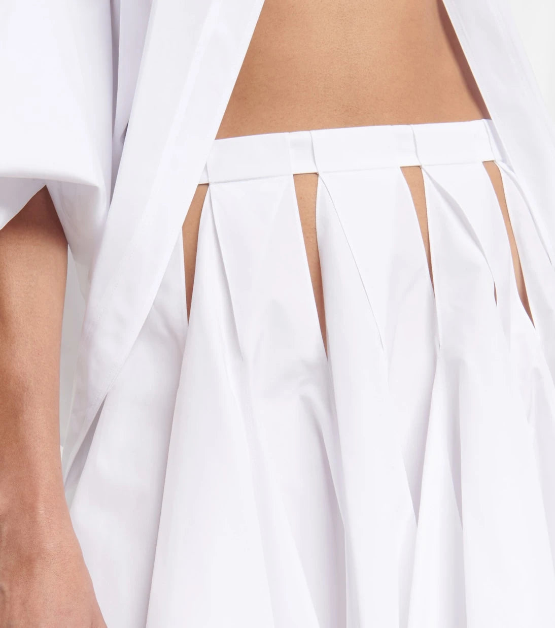 Alaïa - High-rise cutout cotton miniskirt
