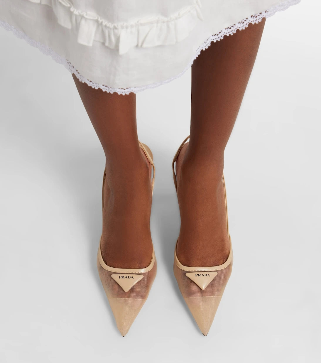 Prada - Leather-trimmed mesh slingback pumps
