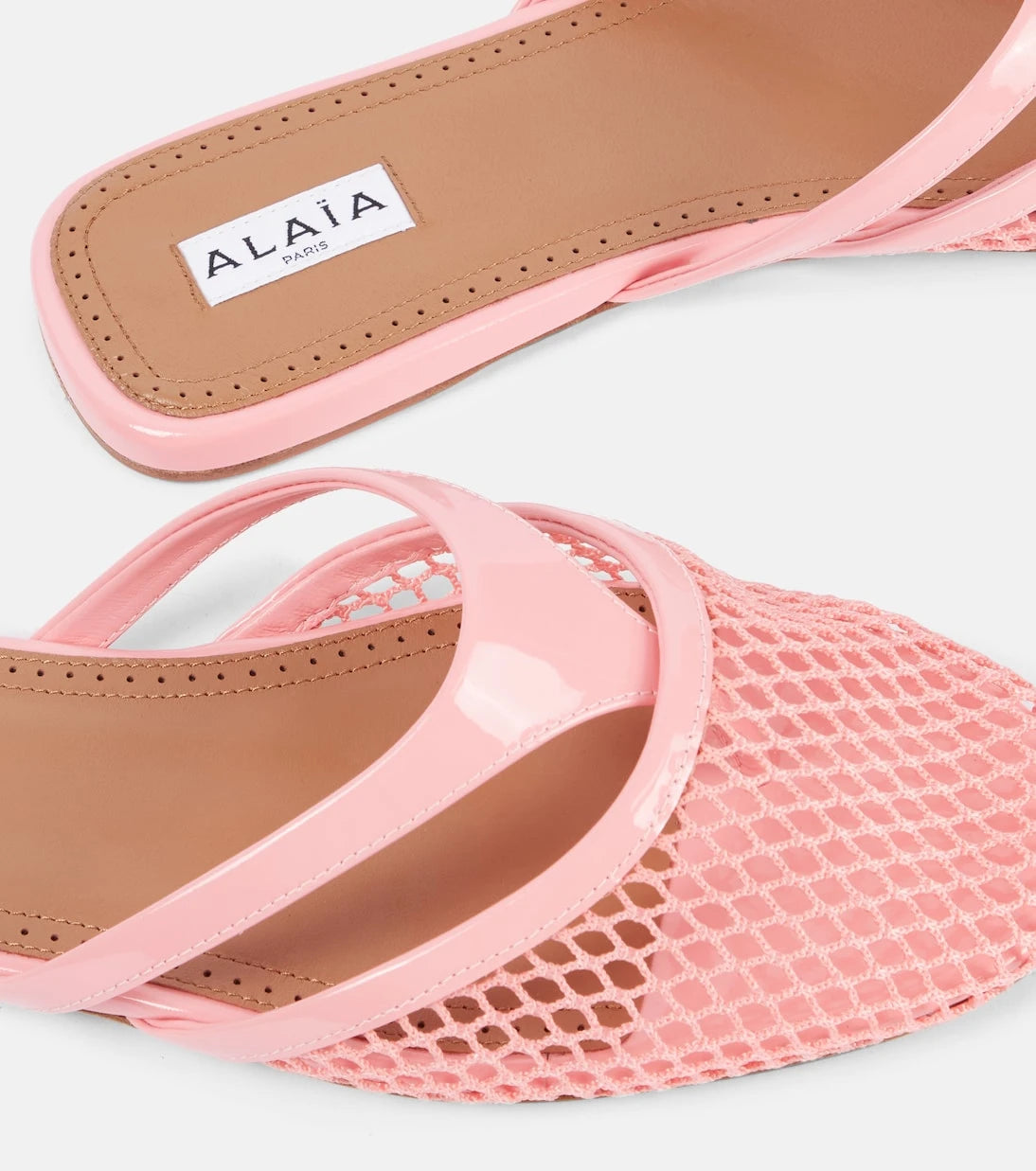 Alaïa - Patent leather-trimmed fishnet mules