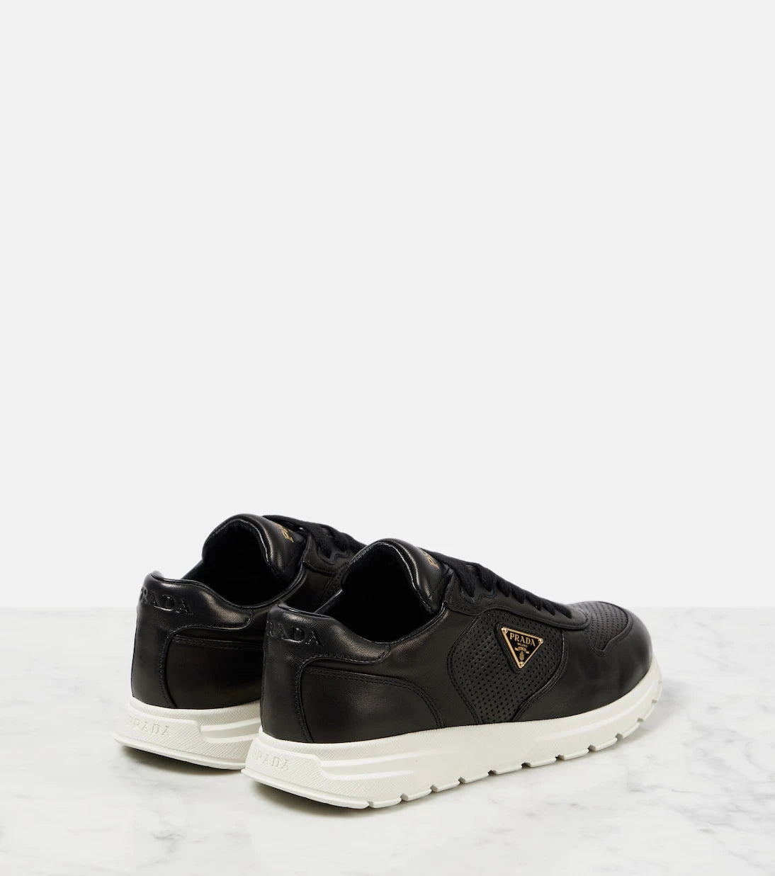 Prada - Logo leather sneakers