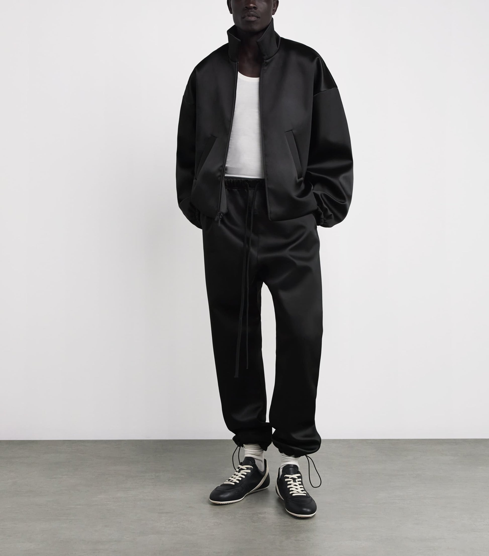 FEAR OF GOD ESSENTIALS Black Bonded Satin Bomber Jacket