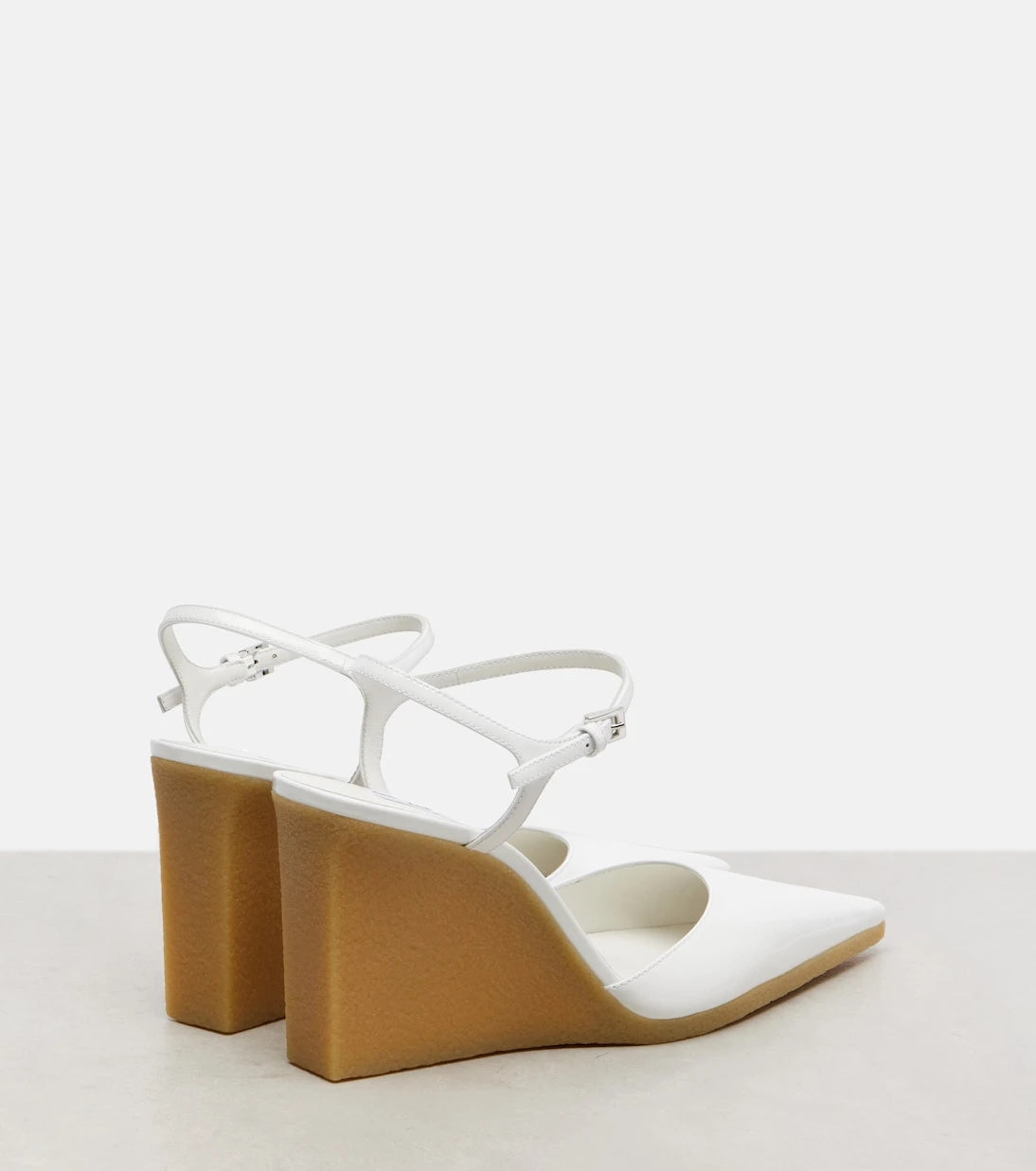 Alaïa - 90 patent leather wedge slingback pumps