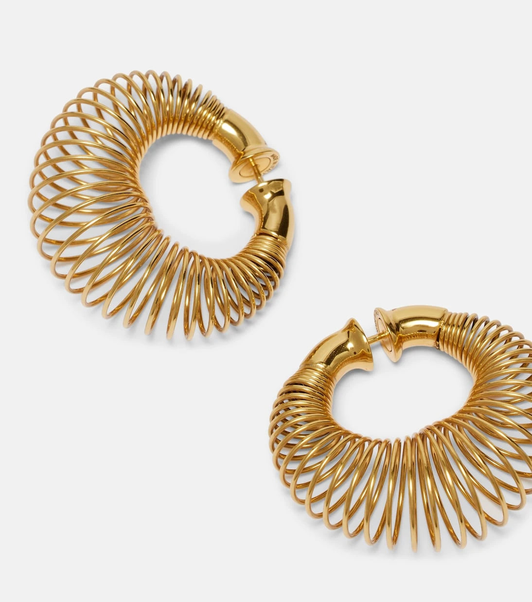 Alaïa - Spiral hoop earrings