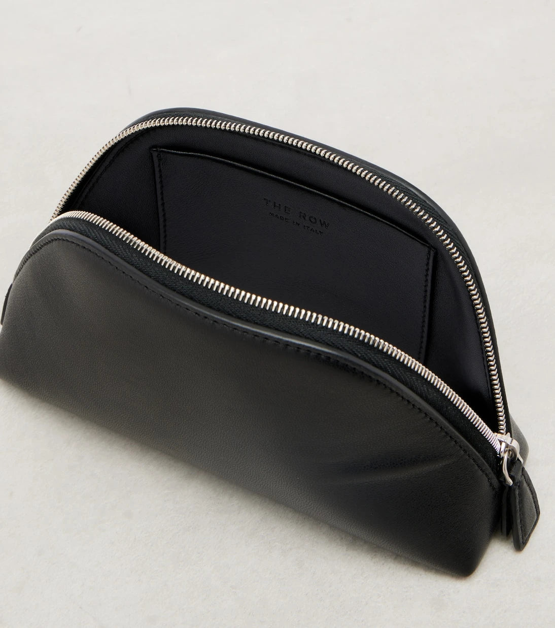 The Row - Devon Mini leather clutch