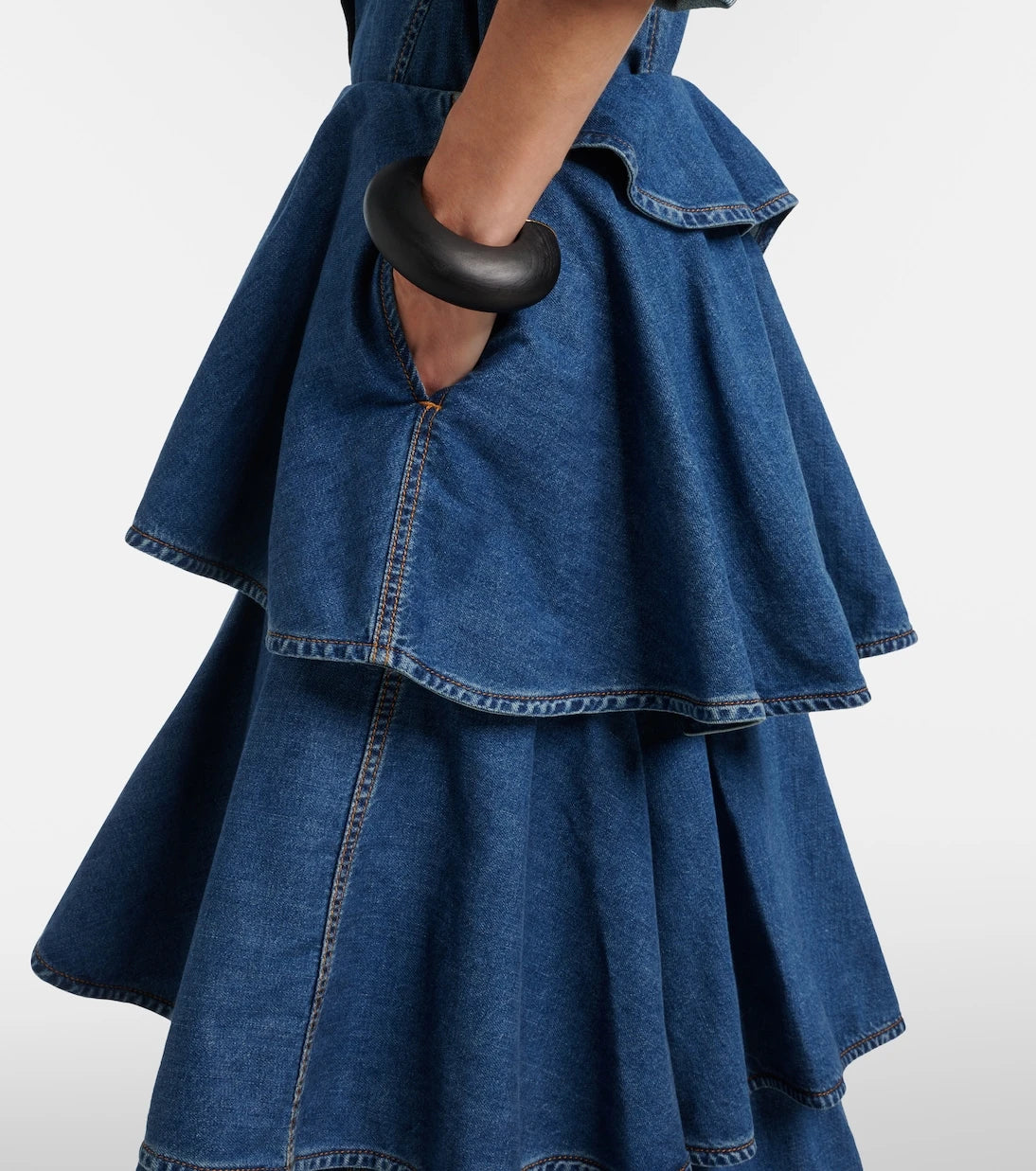 Alaïa - Spiral tiered denim midi skirt