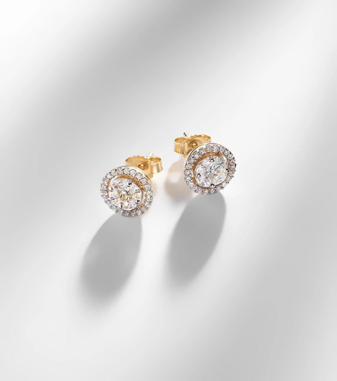 Stone and Strand - 10kt gold earrings with diamonds