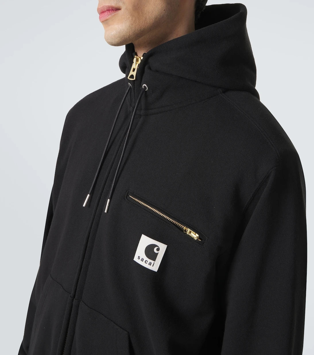 Sacai - هودي من القطن والجرسي من كارها وت