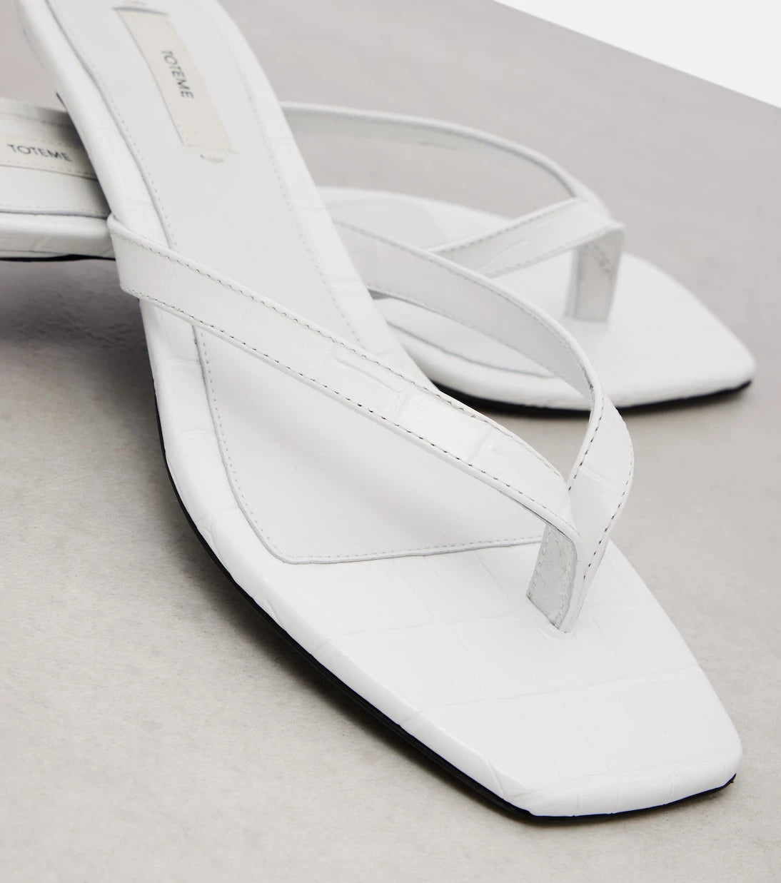 Toteme - Croc-effect leather thong sandals