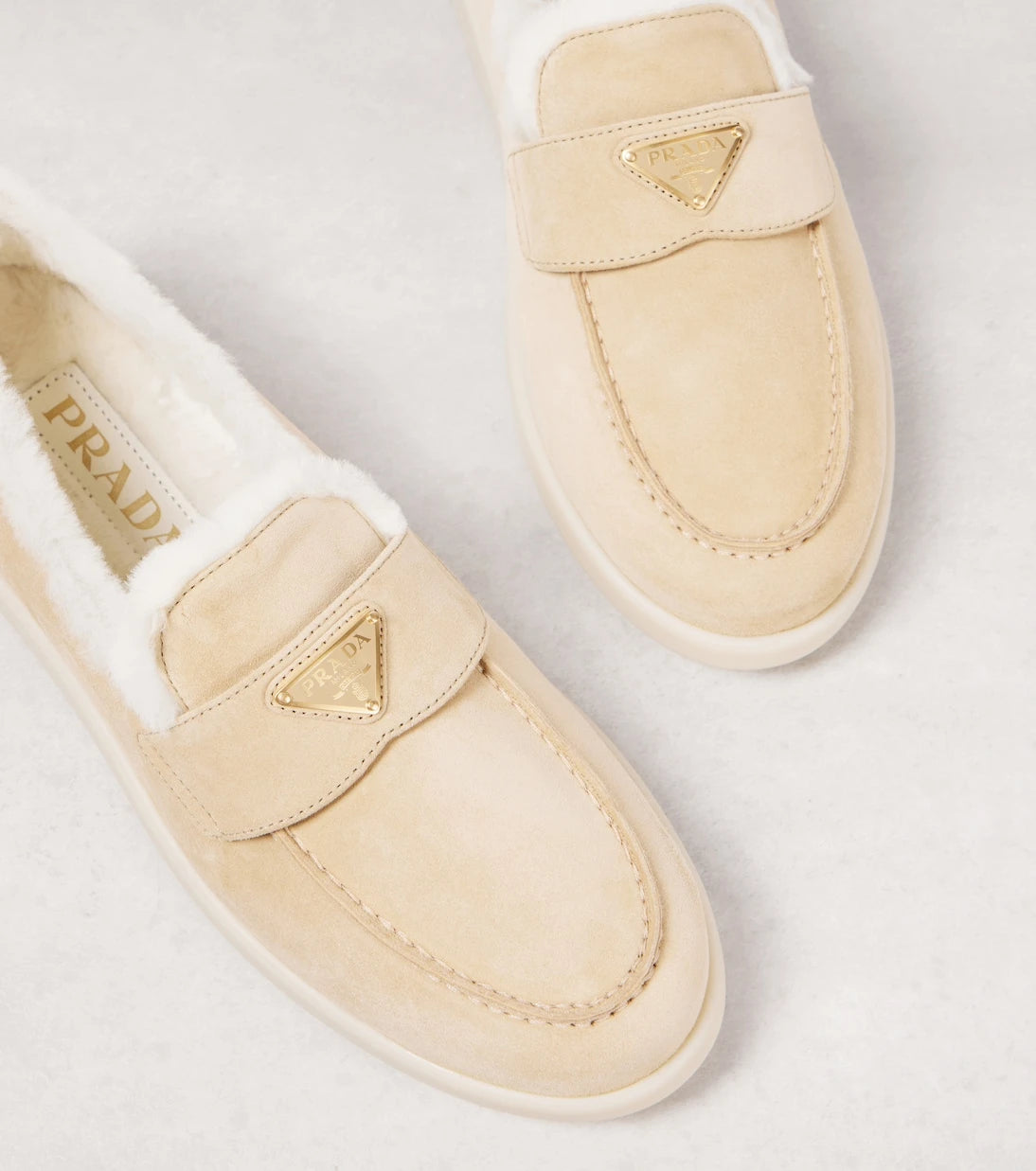 Prada - Shearling-lined suede loafers
