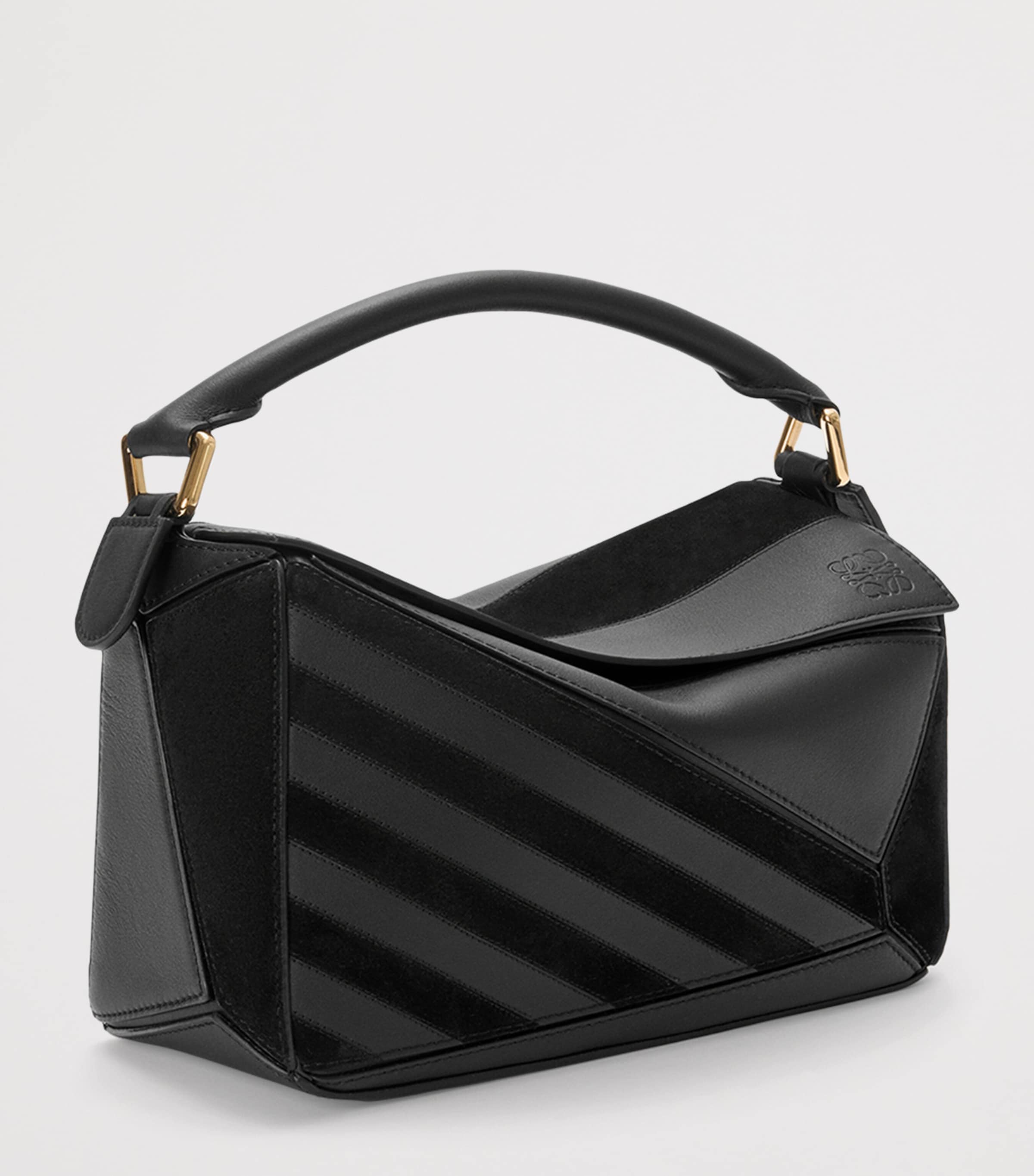 Small Leather Stripe Puzzle Edge Top-Handle Bag