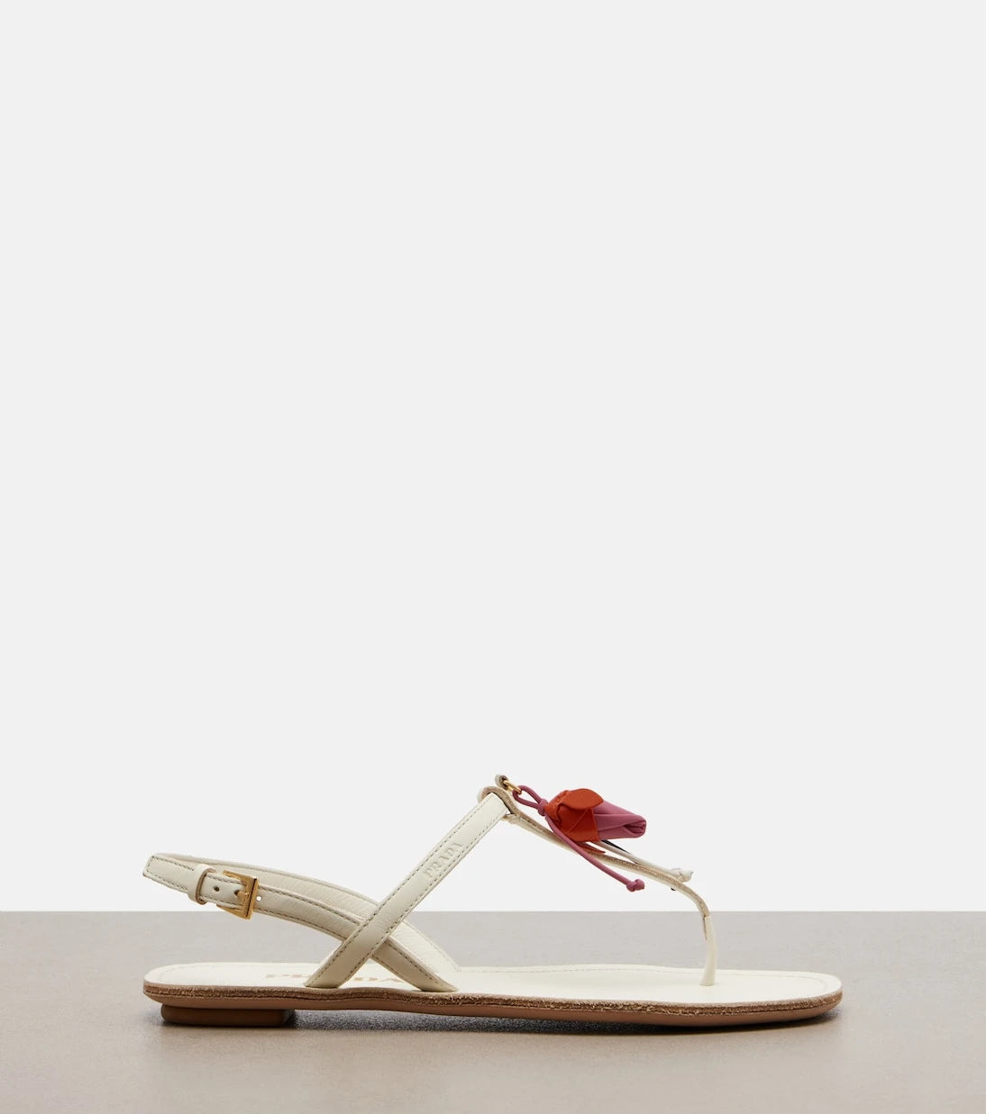 Prada - Floral-appliqué leather thong sandals
