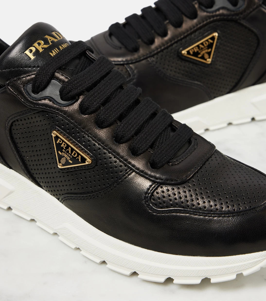 Prada - Logo leather sneakers